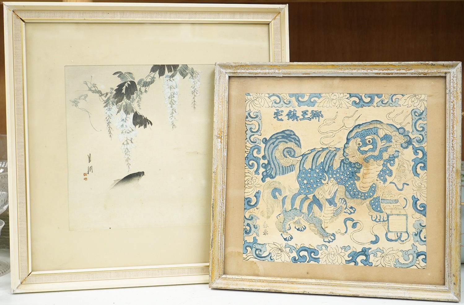 Ogata Gekko (1859-1920), Wisteria and carp, Japanese woodblock print and a Chinese woodblock of a lion dog, 23 x 23cm